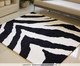 Tapete Sala Savage Wild, black | WestwingNow